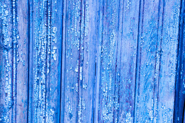 Fototapeta na wymiar Old painted wooden fence. Background texture.
