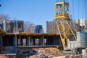 Construction site. High rise Building under construction. Construction of high-rise residential building