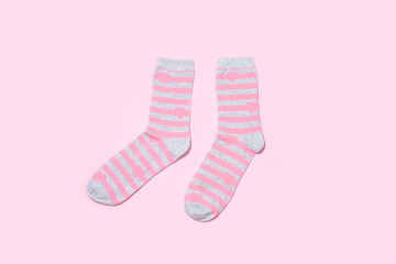 One pair of Women's socks on a colored background