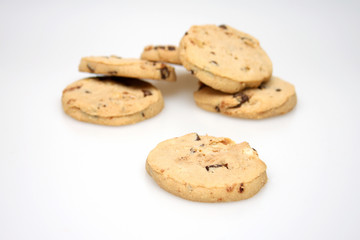 A studio photograph of chocolate chip cookies