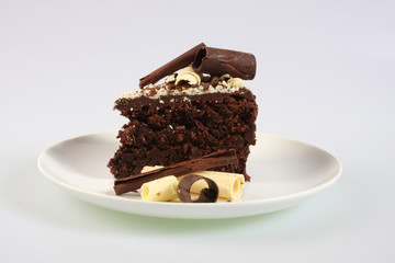 A slice of a chocolate sponge cake
