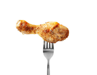 Baked chicken drumstick on a fork isolated on white background
