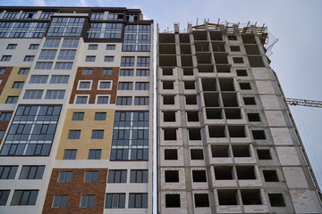 Construction site. High rise Building under construction. Construction of high-rise residential building