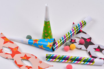 Colorful party items for birthday or carnival on a white background