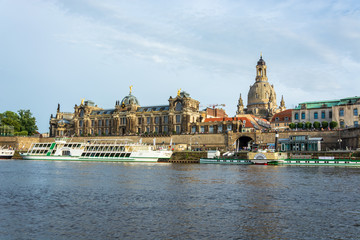 The riverside of Dresden with the church Frauenkirche and the river Elbe