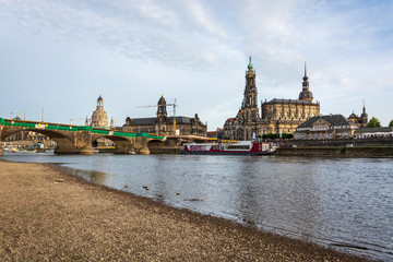 The riverside of Dresden with the tower Hausmannsturm and the river Elbe