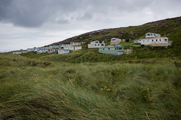 Mobile homes in a trailer park in a field of wheats