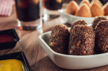 Brazilian appetiser kibbeh (Middle Eastern minced meat and bulghur fried snack)