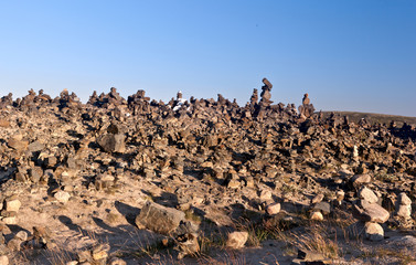 mysterious stone pyramid in the tundra on the shores of the Arctic Ocean