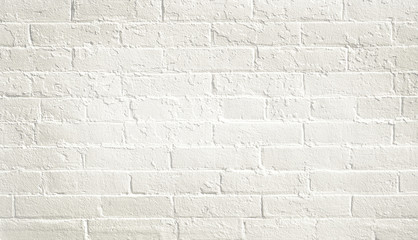 White brick wall background. Neutral texture of a flat brick wall close-up.