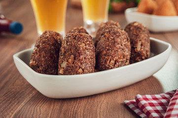 Brazilian appetiser kibbeh (Middle Eastern minced meat and bulghur fried snack)