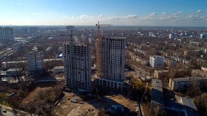 Construction of high-rise residential building. Aerial view of construction of high-rise apartment building.
