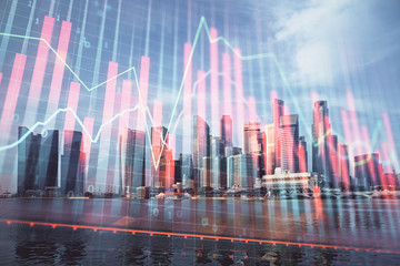 Forex chart on cityscape with tall buildings background multi exposure. Financial research concept.