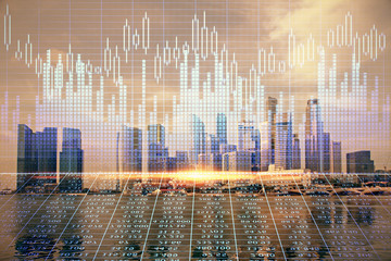 Forex chart on cityscape with tall buildings background multi exposure. Financial research concept.