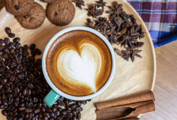 A cup of coffee and beans