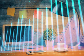 Obraz na płótnie Canvas Multi exposure of graph and financial info and work space with computer background. Concept of international online trading.
