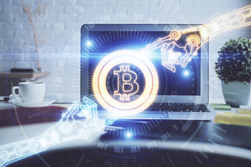 Multi exposure of blockchain and crypto economy theme hologram and table with computer background. Concept of bitcoin cryptocurrency.
