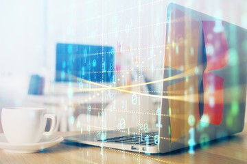 Obraz premium Multi exposure of desktop computer and technology theme hologram. Concept of software development.