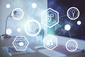 Computer on desktop with social network hologram. Multi exposure. Concept of international people connections.