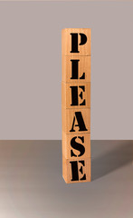 Stack of wood blocks with  Please text