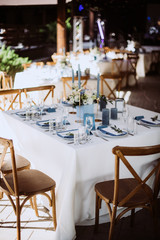 Fototapeta na wymiar Beeautiful wedding table decoration and decor in blue style