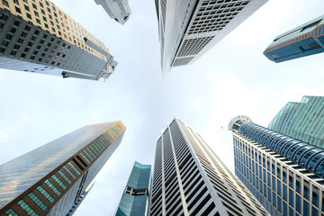 Fototapeta na wymiar low angle view of singapore financial buildings at morning 