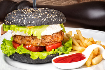 black burger with rye bun