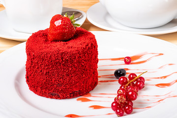 red dessert with strawberries