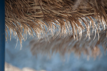 Beach Umbrellas on Empty Beach in Greece