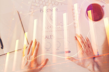 FOREX chart multi exposure with work table background.