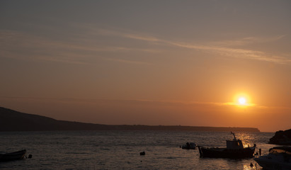 Sunset Over Island From Santorini Greece