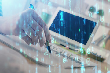 Double exposure of hands making notes with digital coding icons. Computer learning concept.
