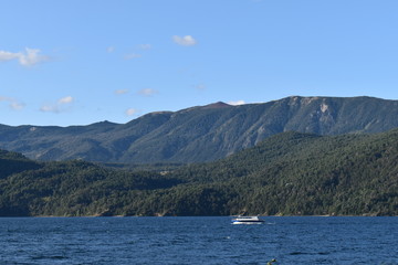 Fototapeta na wymiar Beautiful lake landscape with a boat
