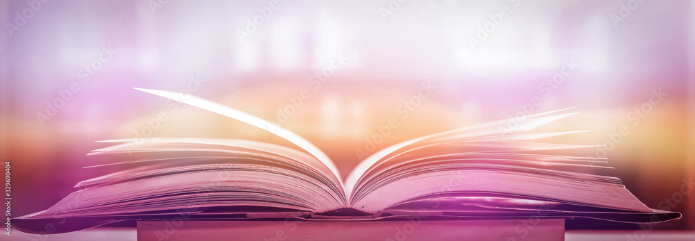 Poster stack of books in the library and blur bookshelf background