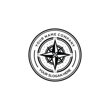 the emblem logo of the compass for the property business, with a window illustration in the middle of the compass showing an overview of real estate property