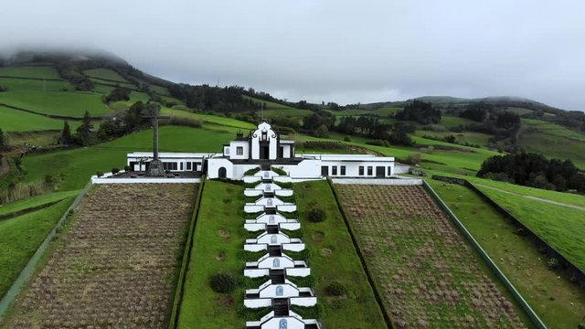 4K aerial footage of the Ermida da Paz church on the top of the mountain with big stairs in S&atilde;o Miguel Island, Azores, Portugal.