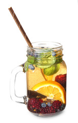 Mason jar of cold tea on white background