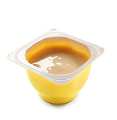 Plastic cup with tasty yogurt on white background