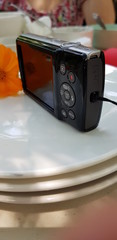 Closeup of compact camera blurred background.  Photography concept.