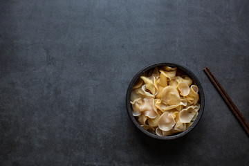 White fungus on a dark background