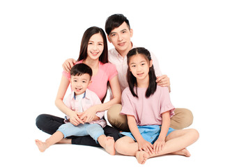 happy young asian family sitting on floor