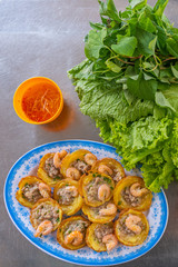 Plate of crispy Vietnamese fried shrimp pancake at food vendor