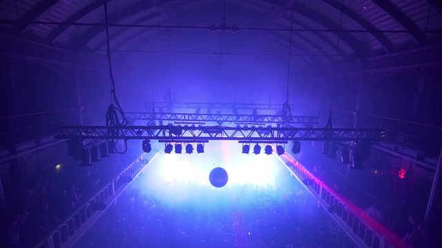 Club Paradiso Amsterdam, Trance party with red flashing lights, overview from above the dance floor