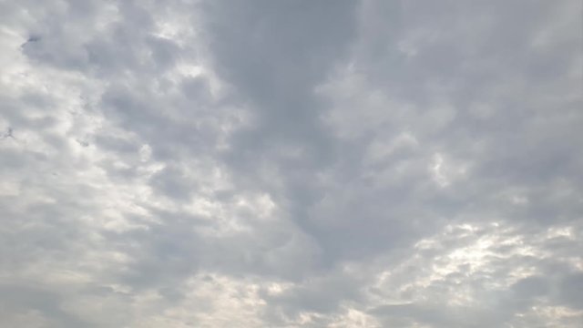 Mid afternoon thunderstorm rain clouds forming and blending across the african horizon  time lapse, noise free 4k footage.
