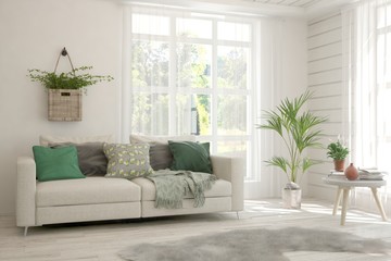 Minimalist living room in white color with sofa and summer landscape in window. Scandinavian interior design. 3D illustration