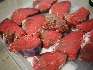Raw beef fillet steaks ready to BBQ grill