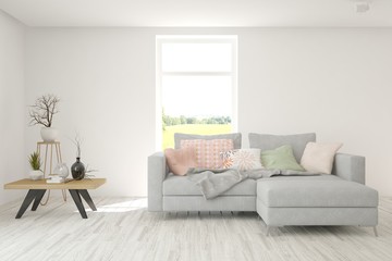 Fototapeta premium Modern living room in white color with sofa. Scandinavian interior design. 3D illustration