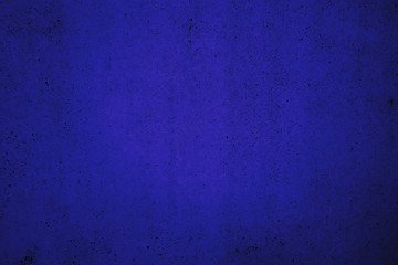 Monochrome blue abstract background. Texture of the old blue wall.