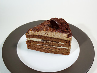 Delicious chocolate sponge cake layered with chocolate cream and finished with chocolate flakes and chocolate coin.