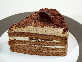 Delicious chocolate sponge cake layered with chocolate cream and finished with chocolate flakes and chocolate coin.